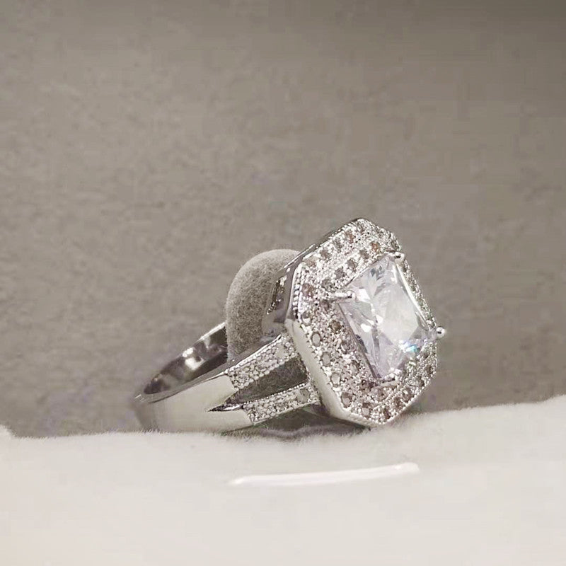 Ring With Topaz And Colorful Diamonds In A Pave Setting